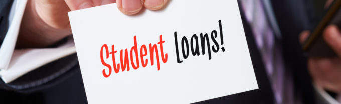 Business card with the words, Student Loans, written on it.